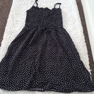Divided| black dress with white polka dots